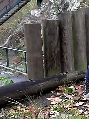 15 pictures - European girl in red tee pisses on fallen leaves