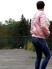 15 pictures - Dark haired girl squats to piss on decking