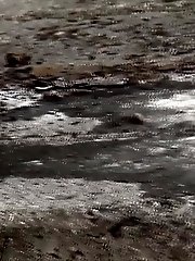15 pictures - Hot blonde pisses onto a concrete slab