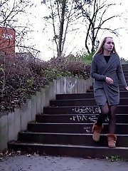 15 pictures - Pretty blonde pisses over steps in the city