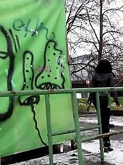 15 pictures - Pretty dark haired girl melts snow as she pees