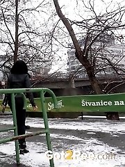 15 pictures - Pretty dark haired girl melts snow as she pees