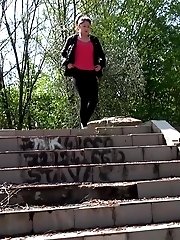 15 pictures - Brunette girl pisses down some concrete steps
