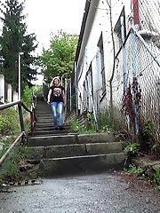 15 pictures - Blonde babe pees on the bottom of some steps