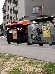 15 pictures - A shy girl needs to piss while outside in the city