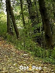 15 pictures - Pretty dark haired girl pisses while on a jog