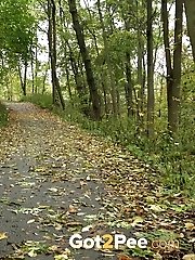 15 pictures - Pretty dark haired girl pisses while on a jog