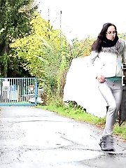 15 pictures - Cute geeky girl in glasses pisses in public