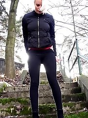 15 pictures - Hot blonde has a warm piss outside on steps