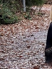 15 pictures - Playful babe nearly wets her panties outside