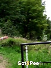 15 pictures - Sweet girl needs to piss as she waits for a bus