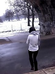 15 pictures - Pretty girl in scarf sprays her golden piss