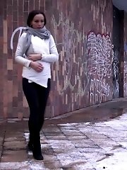 15 pictures - Pretty girl in scarf sprays her golden piss
