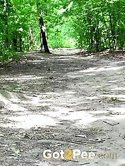 15 pictures - Woodland pissing for seriously hot brunette babe