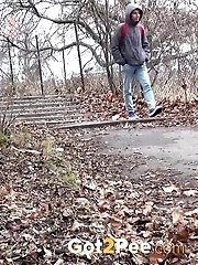 15 pictures - Stunning dark haired girl is caught pissing