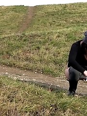 15 pictures - Dark haired babe pisses in the countryside