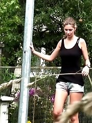 15 pictures - Hot babe is caught pissing twice in this scene