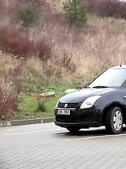 15 pictures - Eveline Neill squats to piss in a car park