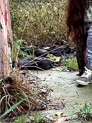 15 pictures - Brunette is filmed in a pee fail wetting her panties