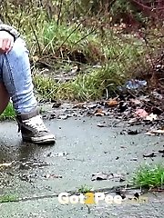 15 pictures - Brunette is filmed in a pee fail wetting her panties