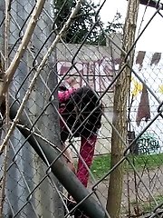15 pictures - Dark haired girl pisses on a public path