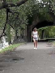 15 pictures - Gorgeous European lifts her leg to piss outside