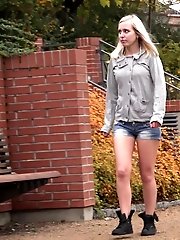 15 pictures - Blonde babe squats on wooden benches to pee