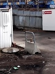 15 pictures - Sexy brunette pissing on an industrial estate