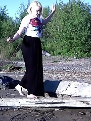 15 pictures - Pretty blonde squatting to pee in the countryside