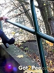 15 pictures - Messy outdoor pissing for pretty blonde babe
