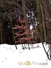 15 pictures - Sexy black haired teen pisses in the snow
