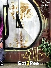 15 pictures - Pretty black haired girl leaves a piss puddle