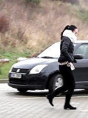 15 pictures - Eveline Neill squats to piss in a car park