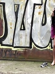 15 pictures - Pretty black haired girl leaves a piss puddle