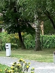 15 pictures - Gorgeous redhead lifts up her legs to piss outside