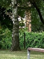 15 pictures - Gorgeous redhead lifts up her legs to piss outside