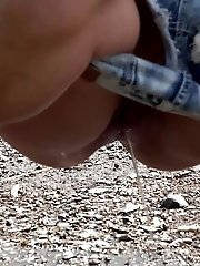 15 pictures - Gorgeous European babe relieves herself outside