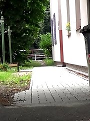 15 pictures - Cute babe makes a piss puddle on the concrete