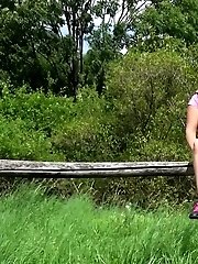 15 pictures - Pretty blonde girl pisses on the grass
