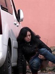 15 pictures - Hot dark haired girl pisses outside