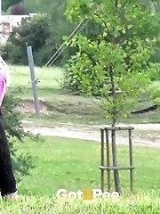15 pictures - Hot blonde pulls down her trousers to pee