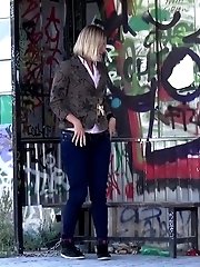 15 pictures - Blonde has fun as she pees while standing