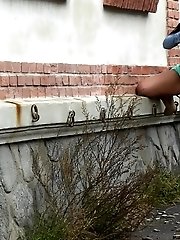 15 pictures - Sexy brunette lifts up her dress to piss