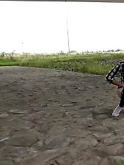 15 pictures - Exotic babe squats to piss near main road