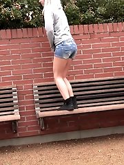 15 pictures - Blonde babe squats on wooden benches to pee