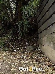 15 pictures - Dark haired babe sprays her piss over the floor