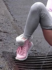 15 pictures - Blonde babe Claudia pisses down a drain outside