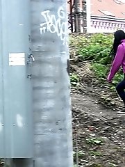 15 pictures - Pretty black haired girl leaves a piss puddle
