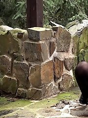 15 pictures - Gorgeous redhead squats to piss outside