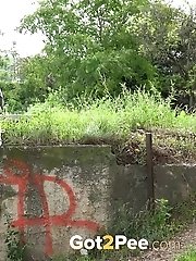 15 pictures - Cute blonde squatting to pee outside in public